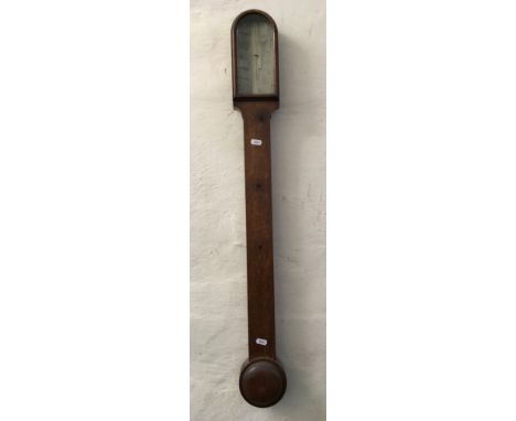 An oak framed stick barometer.