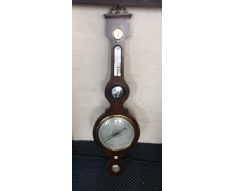 A rosewood framed barometer.