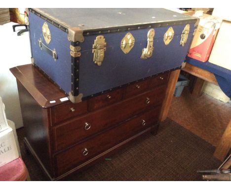 A Stagg five drawer chest, blue travel trunk and occasional table.