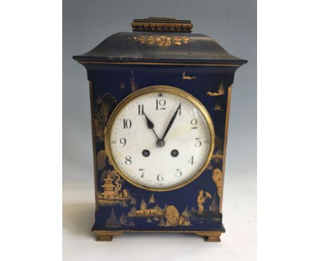 A blue mantel clock with gold painted oriental design, marked 5134 inside. Height 32cm.