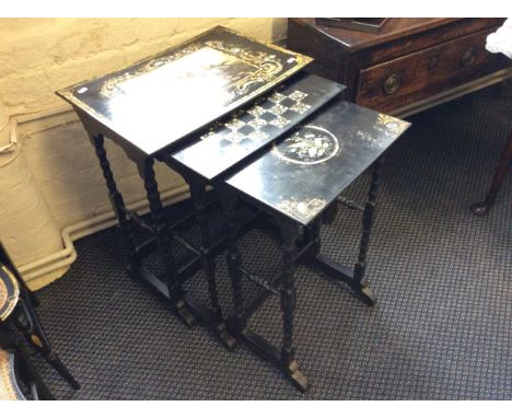 A 19th century papier-mâché mother of pearl decorated nest of three tables with painted Hunting scene to top signed Hawkin.