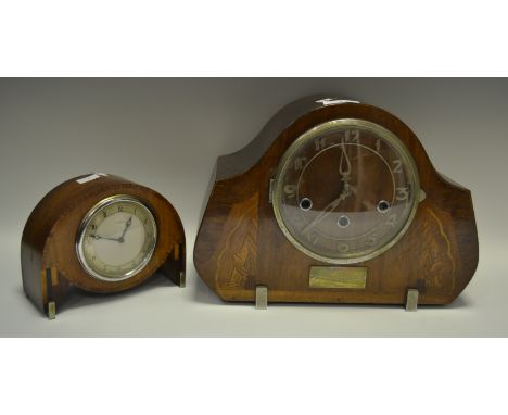 An Art Deco eight-day movement mantel clock, Roman numerals; an oak mantel clock, silvered Arabic numerals; three-train movem