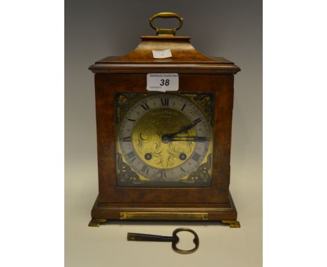 An early-20th century burr walnut carriage clock manufactured by Mappin & Webb, the 13.5 cm square brass dial decorated with 