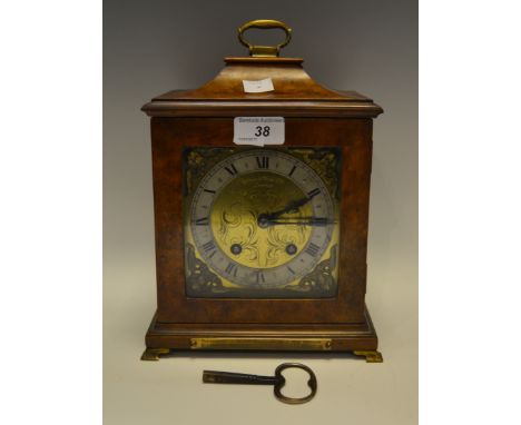 An early-20th century burr walnut carriage clock manufactured by Mappin & Webb, the 13.5 cm square brass dial decorated with 