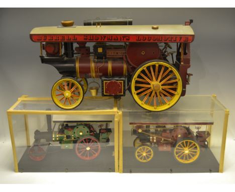 A large Burrell showman's locomotive 'Robin Hood' traction engine; another smaller, cased; a large model of a steam roller, c