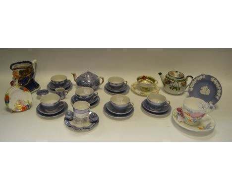 A continental lustre porcelain Child's tea service; a Noritake egg cup; an Allertons pottery Toby Jug; a pair of Carlton Chin