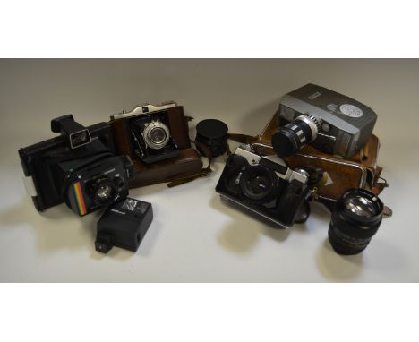 Photographic Interest - Eumig mark M cine film projected boxed; a Nettar camera, cased; a Zenit-E camera cased; an electric e