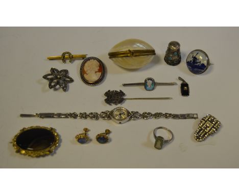 A Charles Horner style silver and turquoise cabochon thimble; a pearl shell purse; a stick pin; a marcasite cocktail watch; e