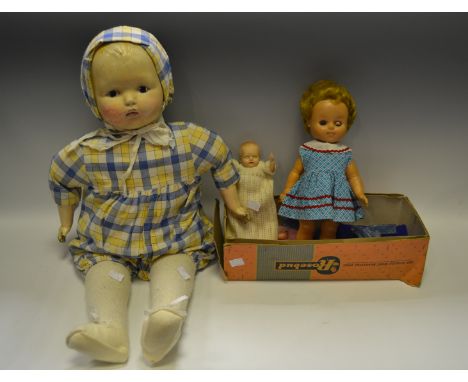 Dolls - a boxed Rosebud Doll; a small plastic doll blue closing eyes; an Effanbee composite Doll (3)