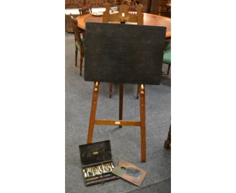 A pitch pine artist's easel; a J. Barnard & Son artist box including oils and palette (2)