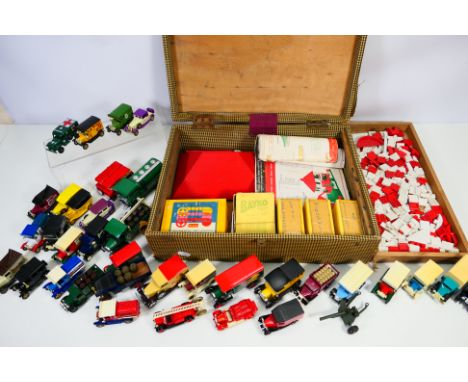 Bayko - Matchbox - Lledo - A wooden boxed Bayko Building Set No3. Shows signs of age and use, the instruction book is present