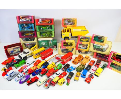Corgi - Matchbox - Tonka - a quantity of boxed and unboxed diecast and other vehicles. The loose vehicles are playworn in var