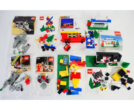 Lego - A group of unboxed kits including Fire Engine # 693, Snack Bar # 675, Windmill # 00-4, Space Scooter # 891, Space Mine