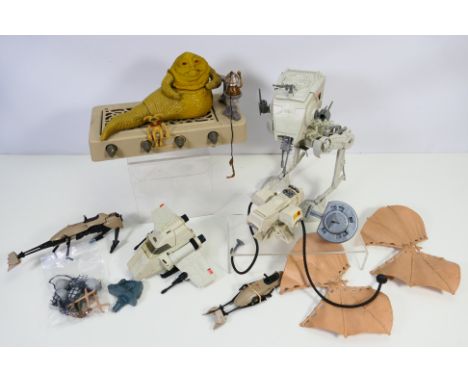 Star Wars - Kenner - A group of items including Jabba The Hut play set, AT-ST Scout Walker,  Speeder Bike, Ewok Glider and ot