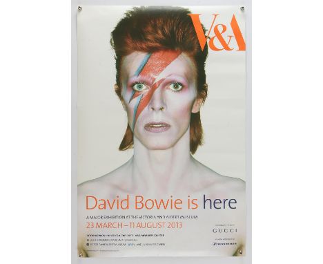 V&A poster for the David Bowie exhibition, this shows Bowie in makeup as his Aladdin Sane persona with the exhibition taking 