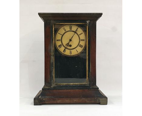 Mahogany-cased mantel clock with Roman numerals to the dial, swept plinth base, block feet