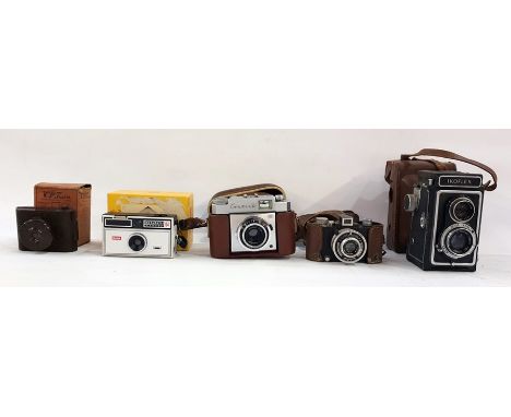 Five assorted cameras to include VP Twin bakelite pocket camera in original box, Kodak 104 Instamatic camera in box, Zeiss Ik