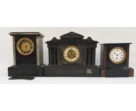 Three black slate assorted mantel clocks, each with Roman numerals, one in the Greco-Roman architectural taste (3) 
