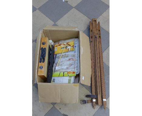 An artist's easel and box of materials