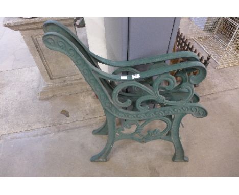 A pair of cast iron bench ends
