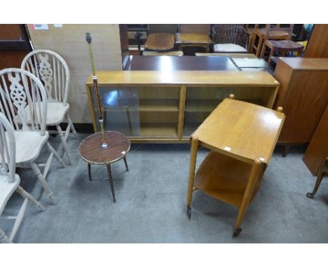 A 1960's oak trolley, bookcase and rosewood effect lamp