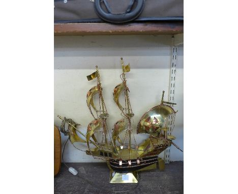 A brass galleon table lamp