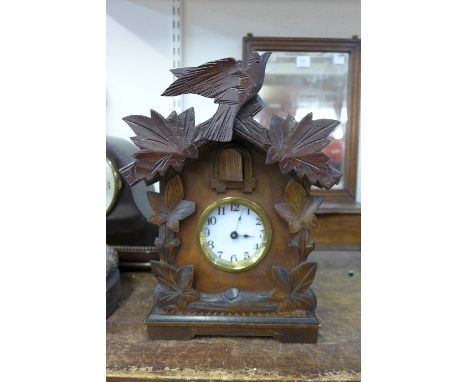 A 1930's cuckoo style mantel clock