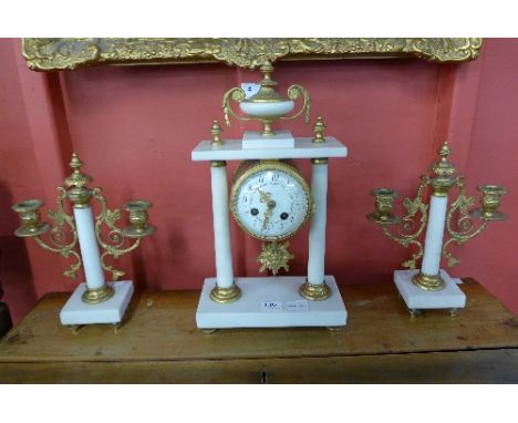 A 19th Century French white marble and ormolu clock garniture, the movement signed Japy Freres, Paris 