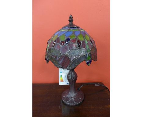 A small Tiffany style lamp