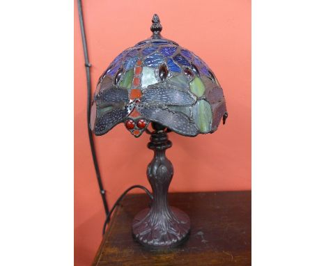 A small Tiffany style lamp