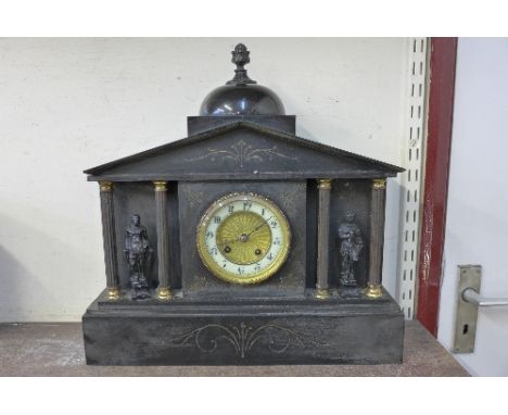 A 19th Century French Belge noir mantel clock