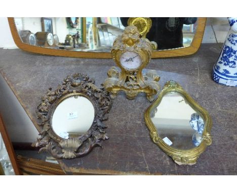 A French style clock and two gilt framed mirrors