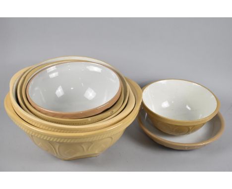 A Collection of Six Vintage Mixing Bowls and a Circular Dish 