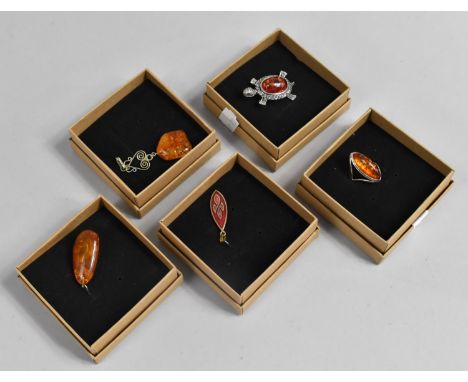 A Collection of Silver and Amber Costume Jewellery to Include Brooches Pendants and Ring 