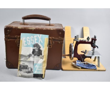 A Vintage Cased Essex Miniature Sewing Machine with Instruction Booklet 