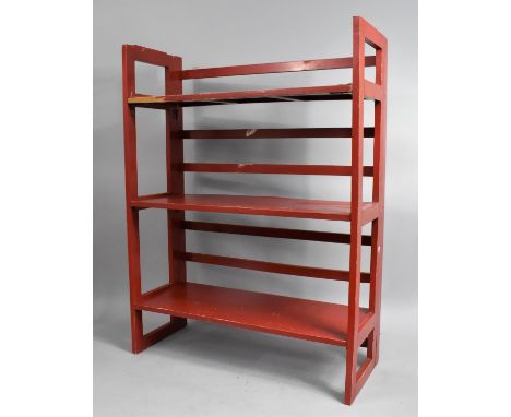 A Mid 20th Century Red Painted Wooden Folding Three Shelf Unit, 70cms Wide 