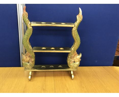 A Chinese carved wooden walking stick stand