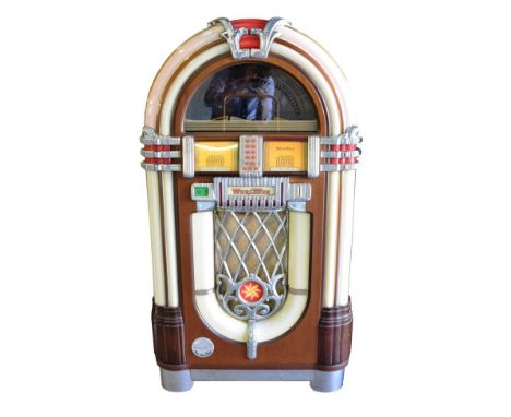 Wurlitzer Model MB20/16 Compact Disc Jukebox no.31029501, classical arched form with chromed highlights, decorative speaker g