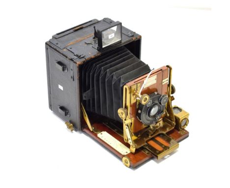 Sanderson The Regular Model Camera with mahogany/brass main body and Compur shutter, for 4 1/4x 3 1/4'' plates 