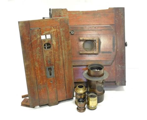 Tailboard Mahogany 14x17 Camera with large brass lens engraved 'Derogy Optician a Paris, Herbert Watkins' and three smaller l