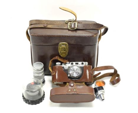 Reid &amp; Sigrist Ltd Rangefinder Camera no.2395, with Taylor-Hobson Anastigmat f2 2in lens, in manufacturers leather case w