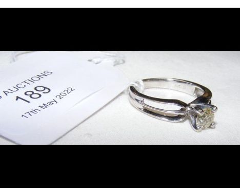 An 18ct white gold 0.5 carat diamond solitaire ring