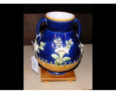 A Mintons majolica vase with twin handles with impress beneath 'Minton 1316' - 16cms highCONDITION REPORTsigns of loss as per