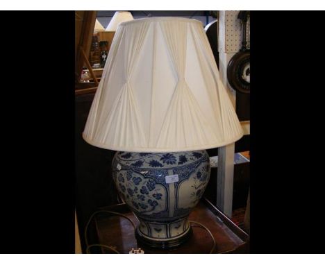 An Oriental style blue and white table lamp