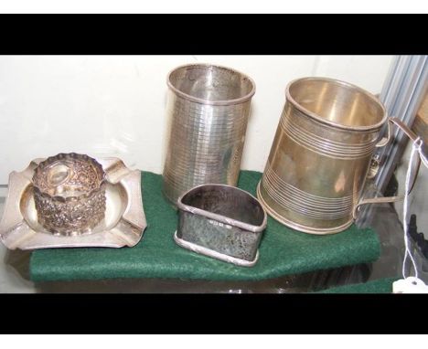 A silver tankard, napkin ring etc.