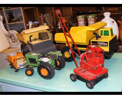A Lines Bros. model of a 4 tonne Jones Mobile Crane, together with several Tonka dumper trucks and a Rico tractor 