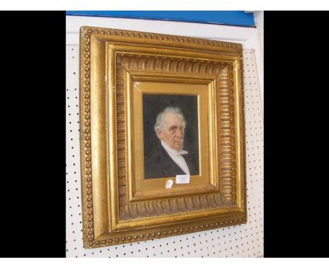 A portrait of a Victorian gentleman in decorative gilt frame