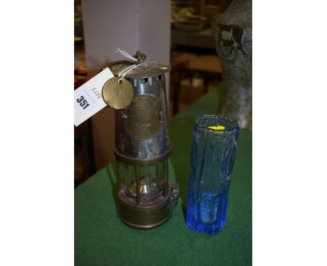 A brass and steel Protector Lamp & Lighting miner's lamp, Type SL, no. 150; and a white fairry style glass vase.  (2)