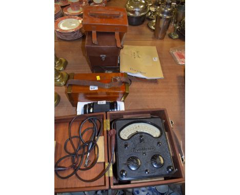 An Avometer, model no. 40; a Vivitar camera lens; a mahogany box with brass and leather bindings; and other items.