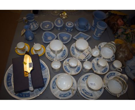 A Coalport Revelry tea service; two crescent coffee cups and saucers; and Wedgewood blue Jasper ware items.